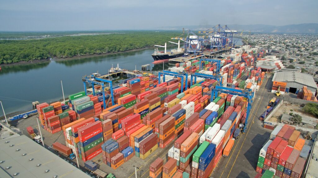 What USA imports from China - An aerial view of a large port filled with numerous shipping containers