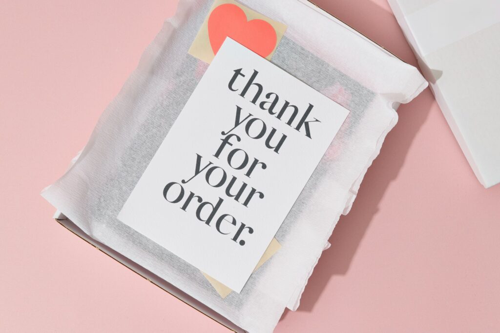 Amazon product inserts - A "thank you" card placed inside an order box