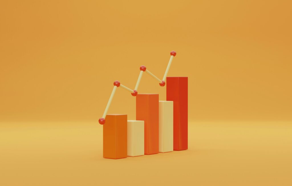 Amazon stats - A 3D bar chart and line graph showing an upward trend in sales