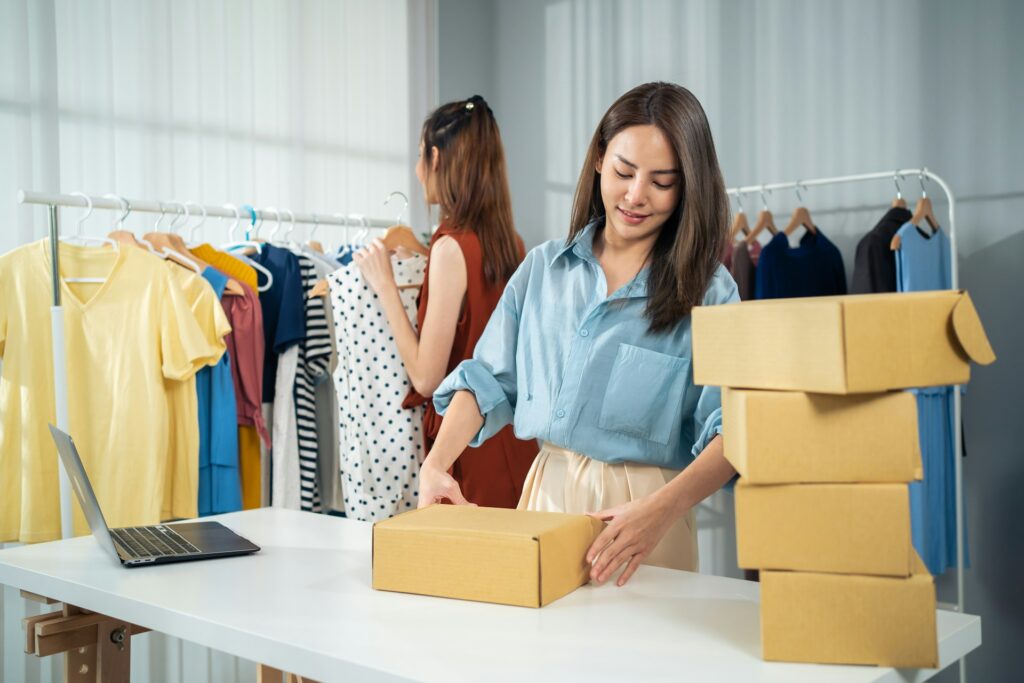 Sell Amazon directly Amazon Vendor Central - Two women preparing packages for shipment