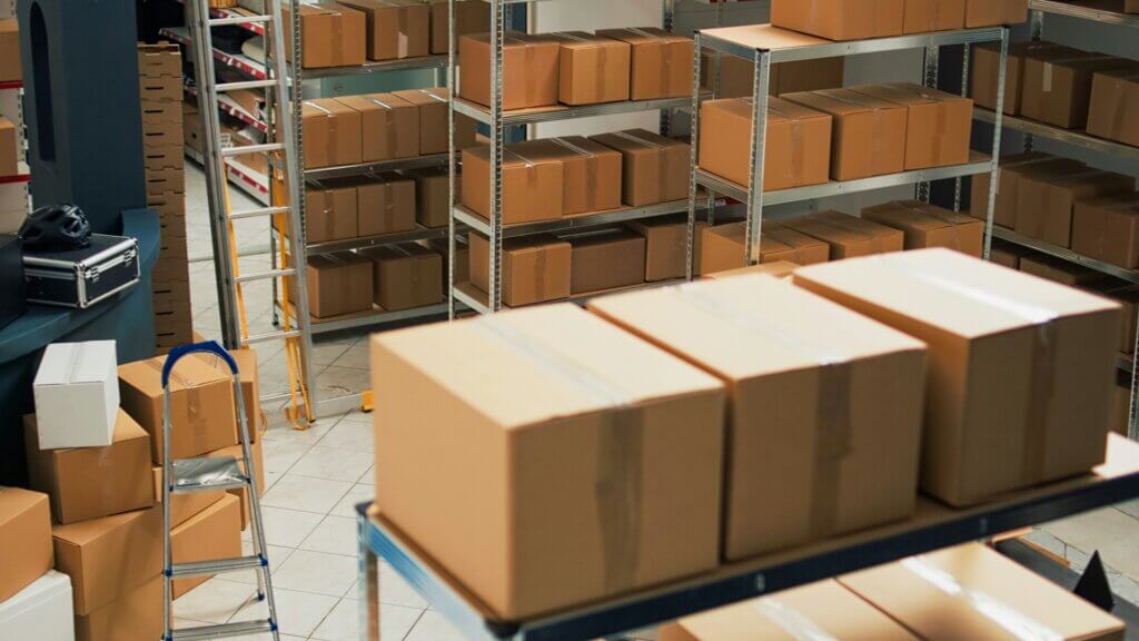 Best dropshipping tool - A warehouse with shelves full of packages ready for shipping