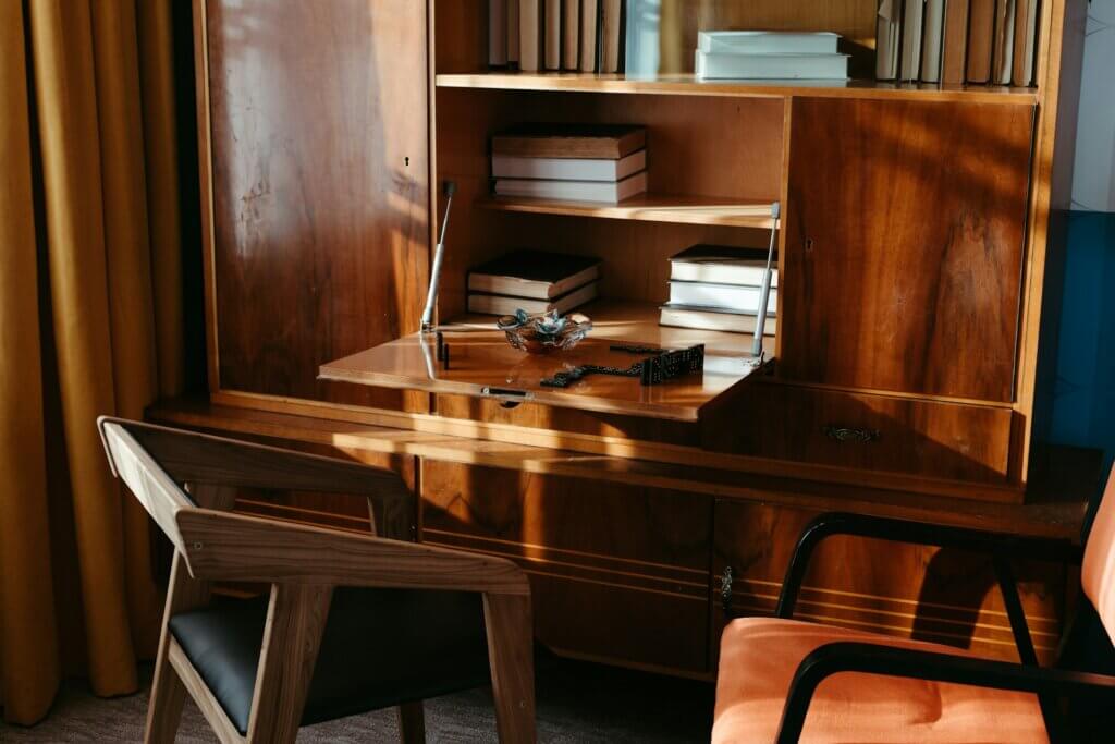 Furniture flipping - An antique wooden cabinet with a desk area