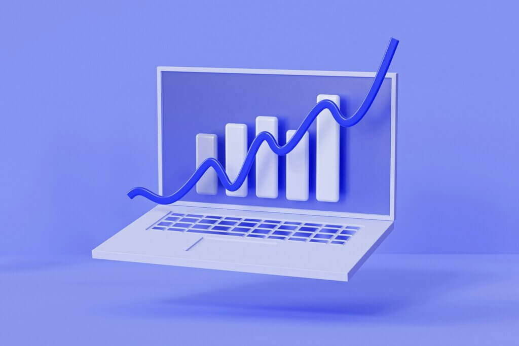 amazon-seller-analytics-tools - A 3D laptop displaying a rising arrow and bar graph on a purple background