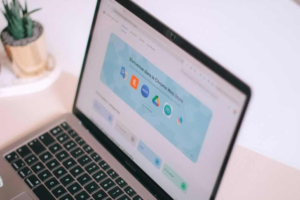 Best chrome extensions for amazon sellers - A laptop displaying the Chrome Web Store on its screen.